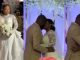 Guests sMercy Chinwo and husband kiss amid speaking in tongues during their church weddingcream in excitement as Mercy Chinwo and husband kiss amid speaking in tongues during their church wedding (VIDEO) 1